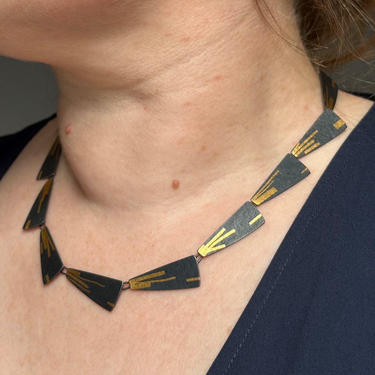 Flight stream necklace