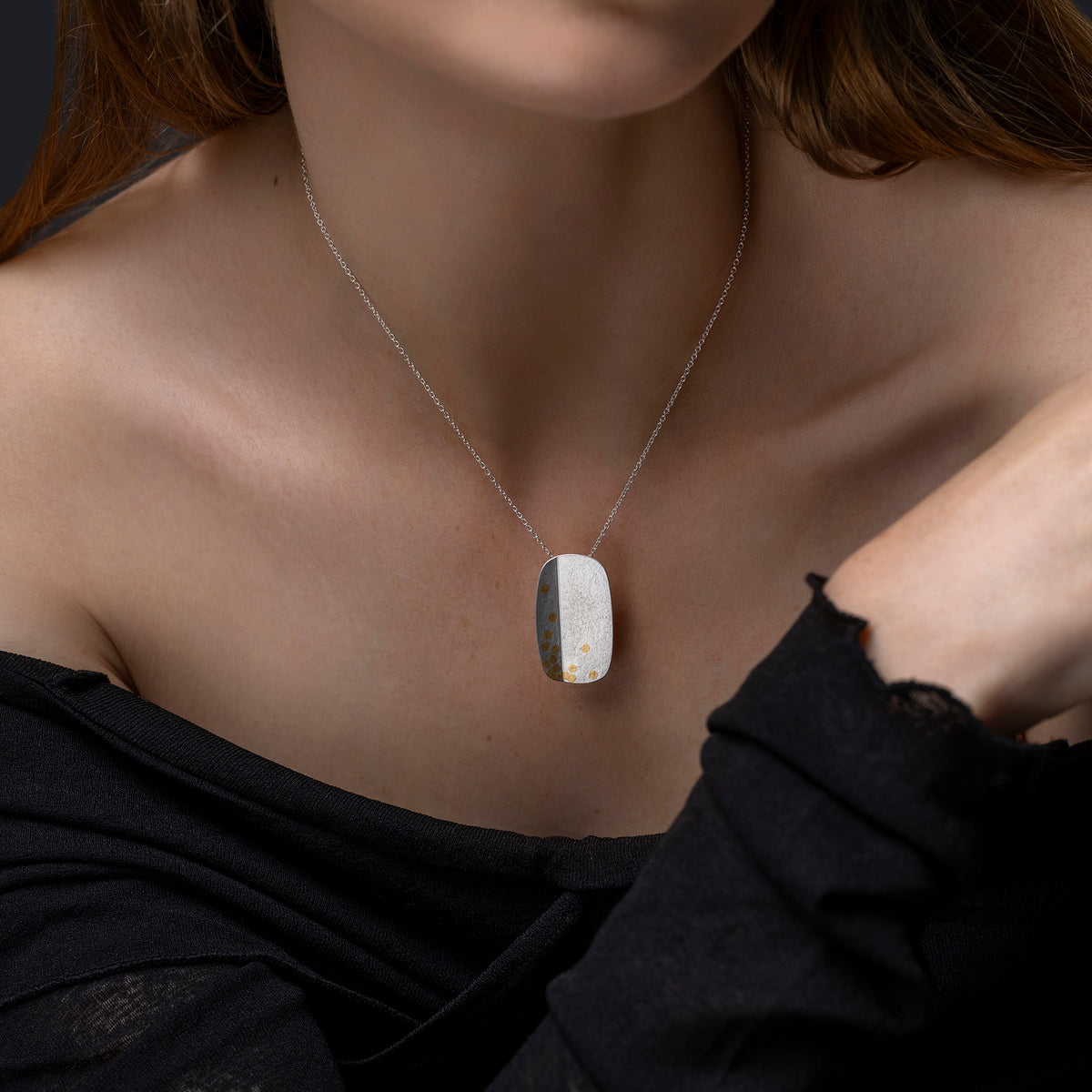 Oblong fold and dot pendant - silver
