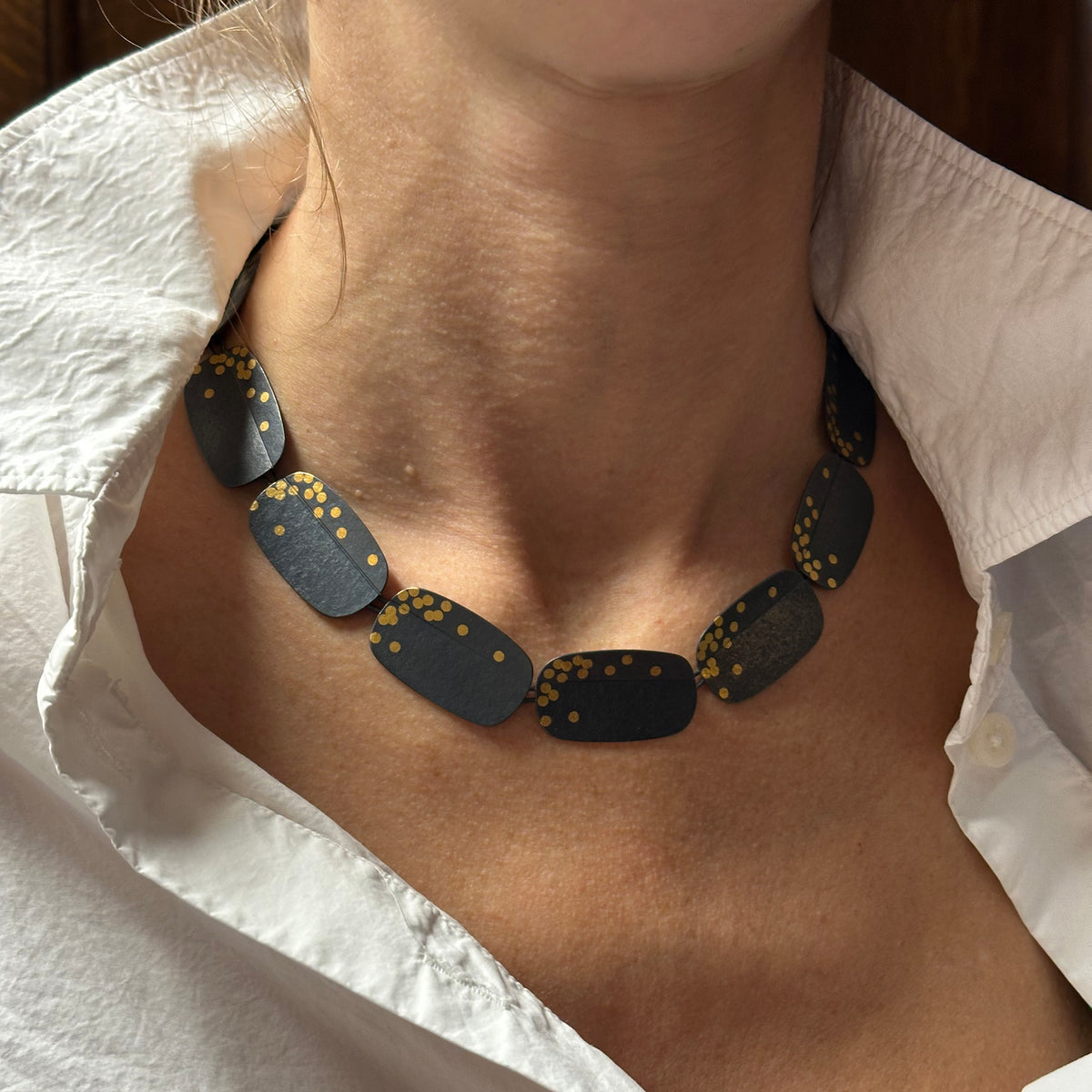 Oblong fold and dot necklace - oxidised