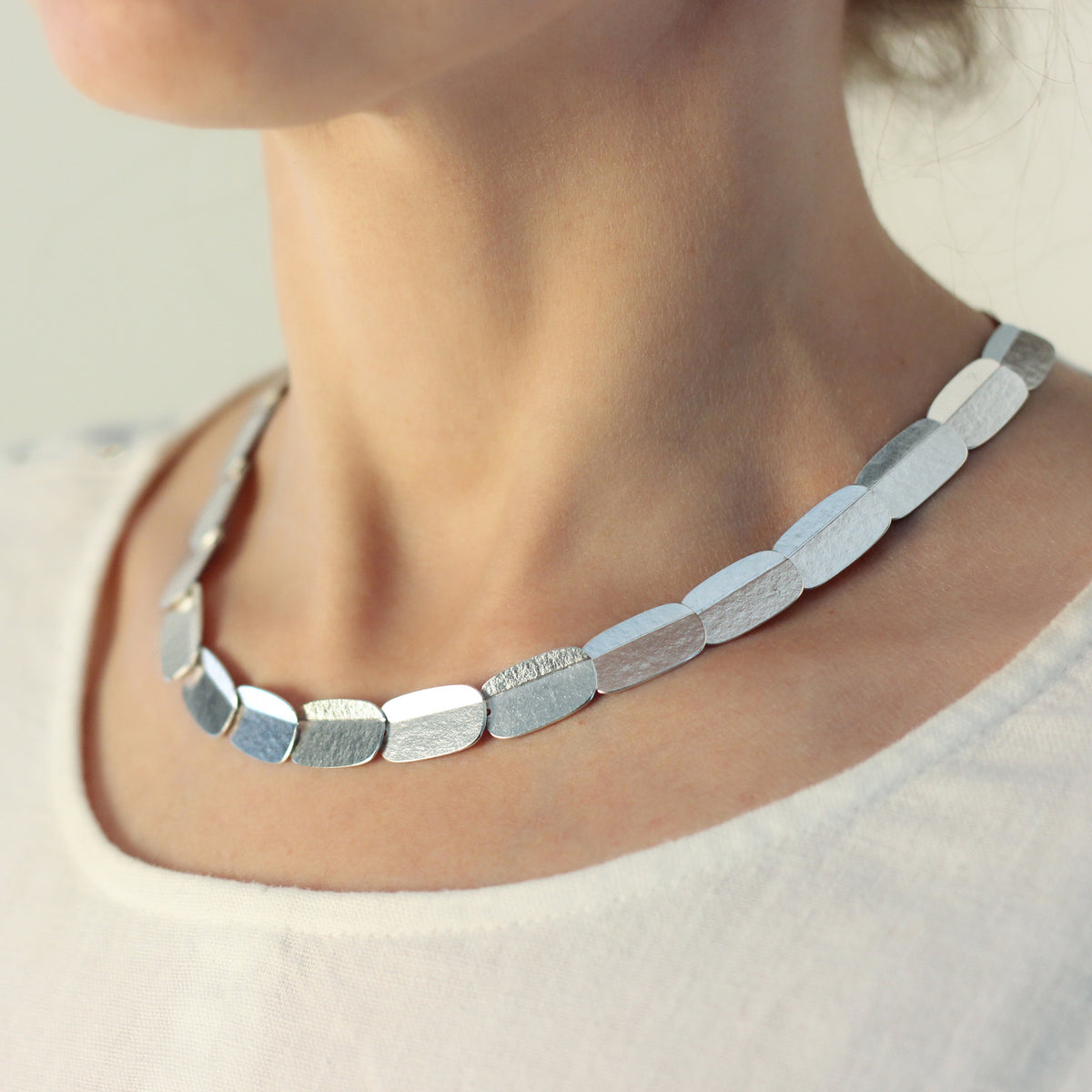 Oblong fold overlap necklace