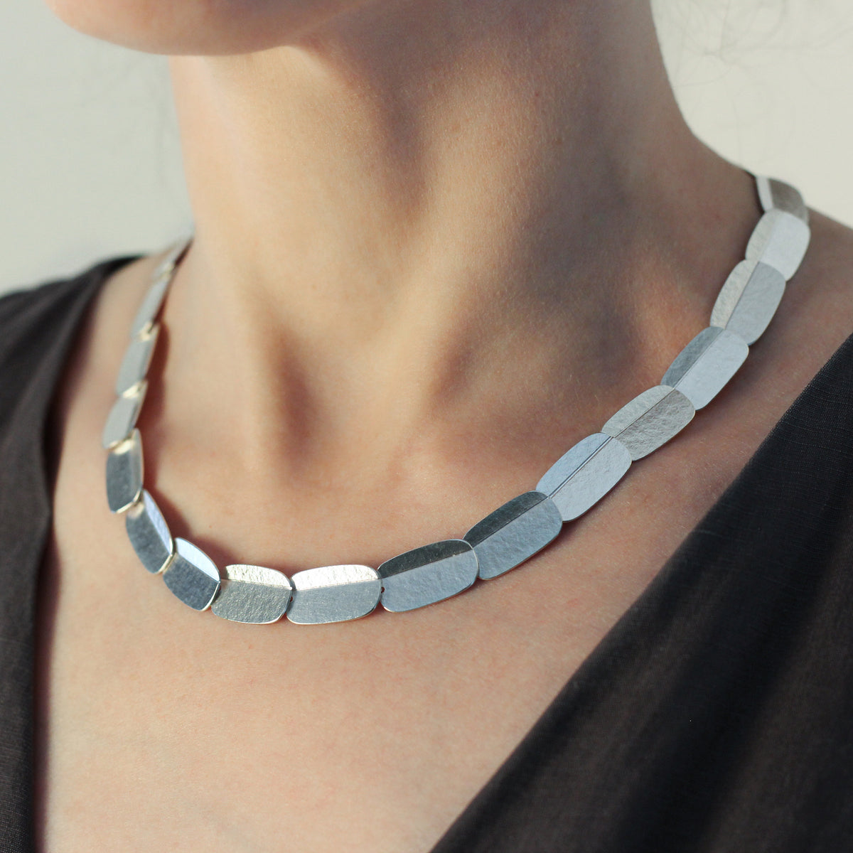 Oblong fold overlap necklace