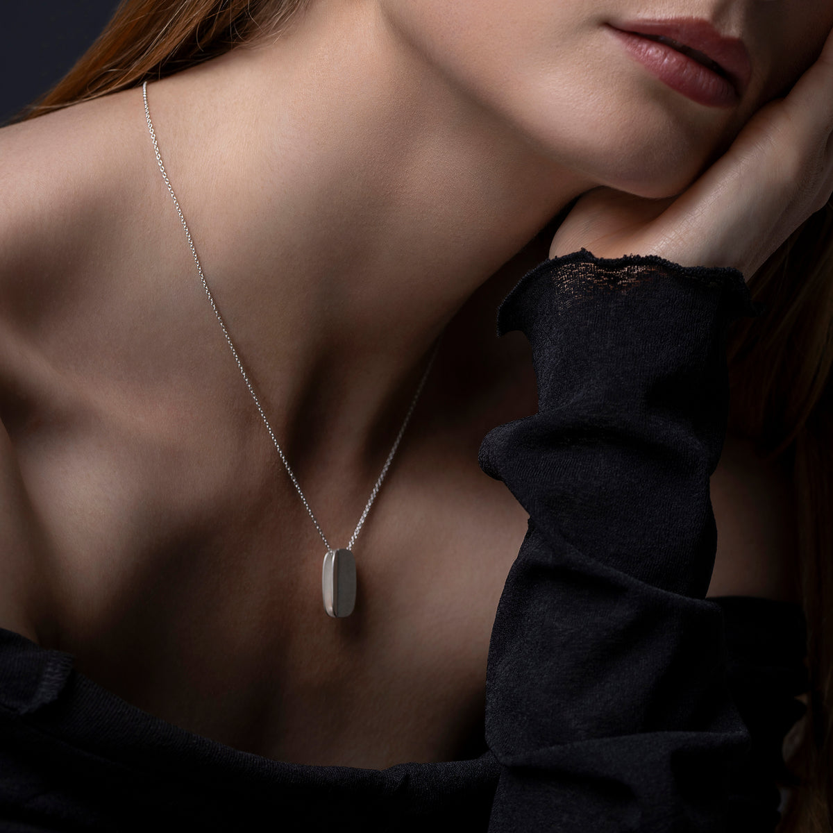 Double oblong fold pendant