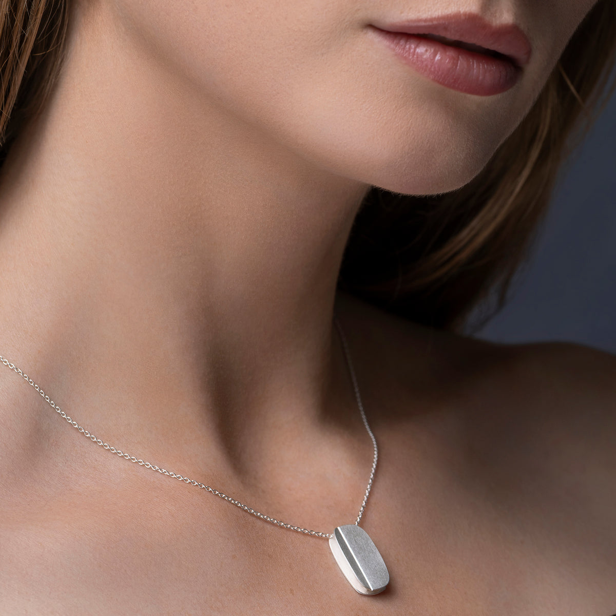 Double oblong fold pendant