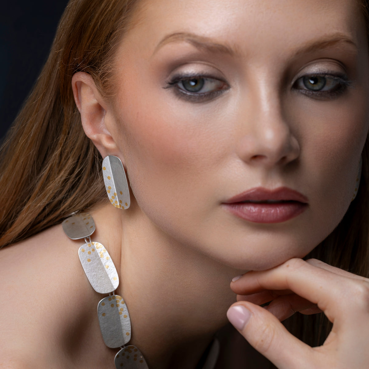 Oblong fold and dot earrings - silver