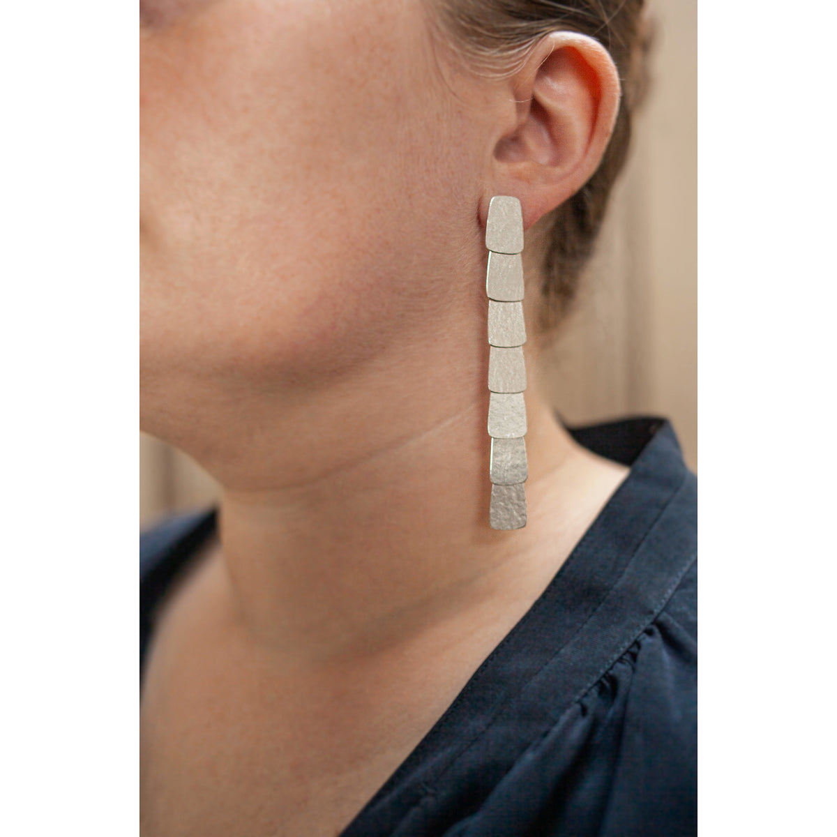 Seven tier silver earrings