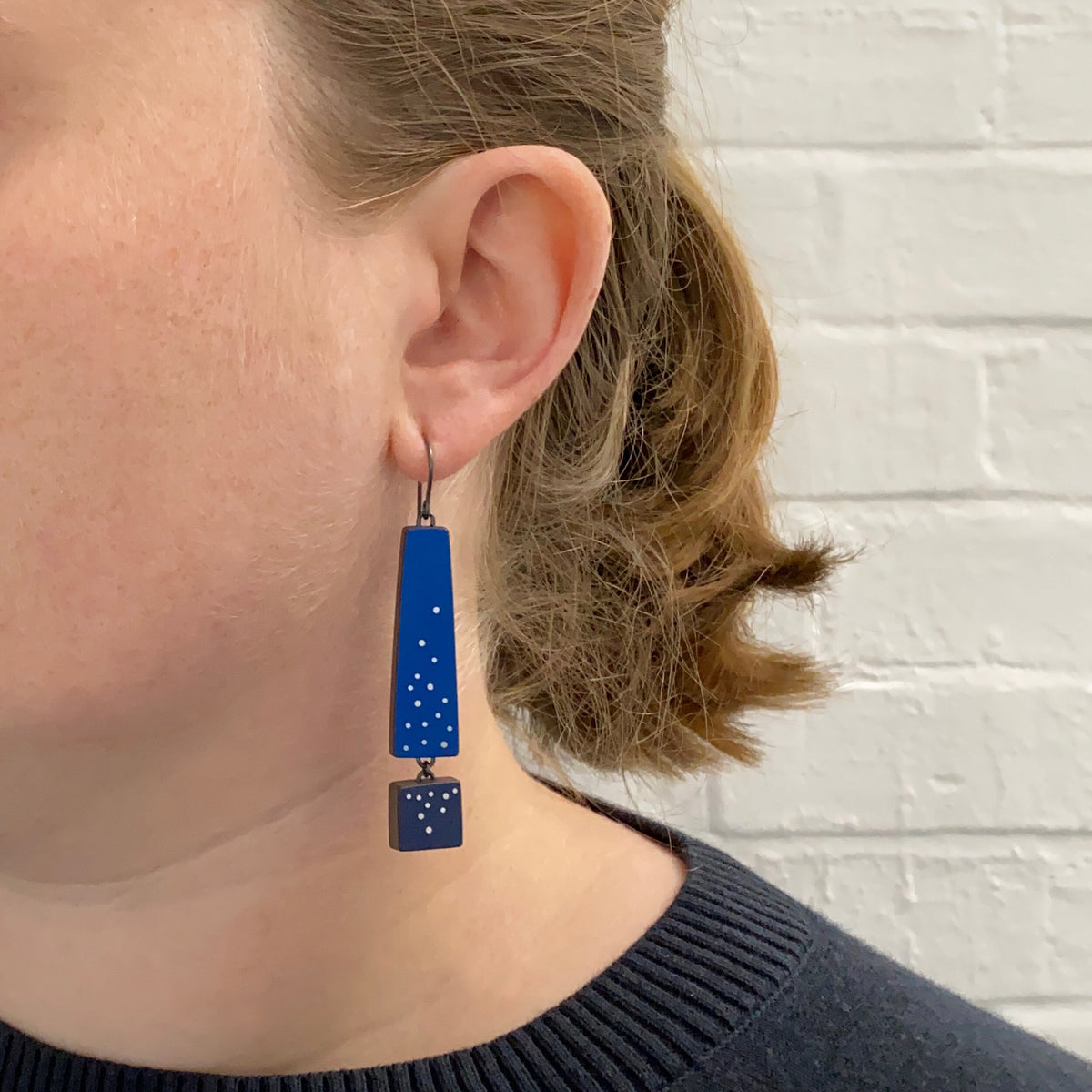 Two blue earrings